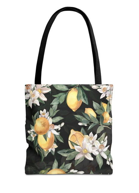 Tote bag with lemon and flower pattern on a black background