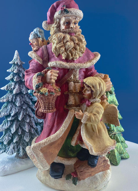 Large Vintage Santa Figurine with Little Girl and Bag of Gifts. Christmas Decoration. Holiday Celebration. Retail Home Seasonal Display.