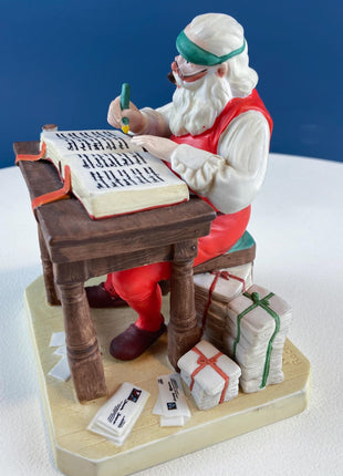 Vintage Porcelain Figurine of Santa Checking His List by Norman Rockwell. Seasonal Display for Home Retail or Office. Collectible Statuette.