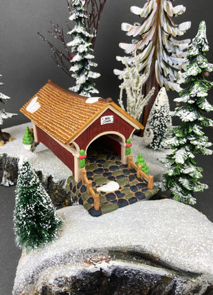Christmas Village Stone Bridge by Dept. 56. Porcelain Bridge with Pine Trees. Holiday Seasonal Home or Retail Decor.