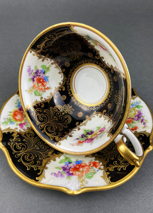 Antique Schumann ArzbergTea Cup and Saucer. Black and Gold. Made in Germany.