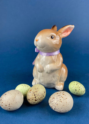 SOLD. Cute Porcelain Bunny Figurine. Hand-Painted Brown Baby Rabbit with Purple Ribbon. Vintage Easter Display. Spring Celebration. Kids Room.
