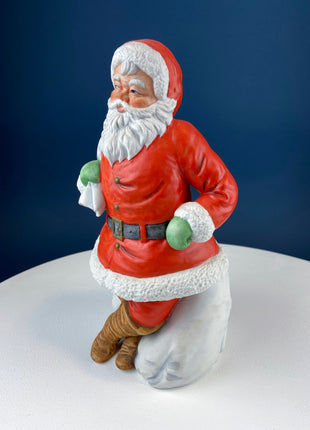 Large Vintage Santa Figurine with Little Girl and Bag of Gifts. Christmas Decoration. Holiday Celebration. Retail Home Seasonal Display.