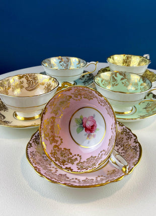 Rare 5 Piece Collection of Pastel Colored Vintage Paragon Cups & Saucers. Stunning Rich Design with Rose Motif and Gold Borders. Fine Dining