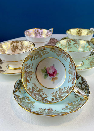 Rare 5 Piece Collection of Pastel Colored Vintage Paragon Cups & Saucers. Stunning Rich Design with Rose Motif and Gold Borders. Fine Dining