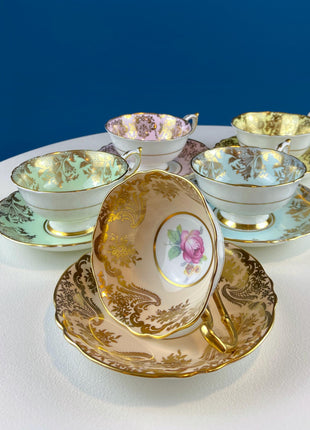 Rare 5 Piece Collection of Pastel Colored Vintage Paragon Cups & Saucers. Stunning Rich Design with Rose Motif and Gold Borders. Fine Dining