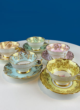 Rare 5 Piece Collection of Pastel Colored Vintage Paragon Cups & Saucers. Stunning Rich Design with Rose Motif and Gold Borders. Fine Dining