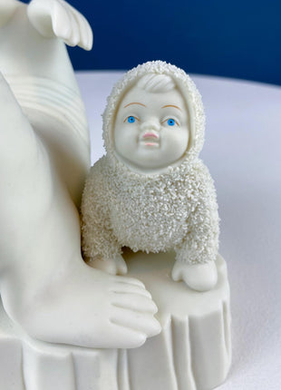 Snow Baby Imitating Seal Trying to Reach a Star. Snow Babies Figurine Celebrating Friendship. Department 56 Collectibles. Kids Room.