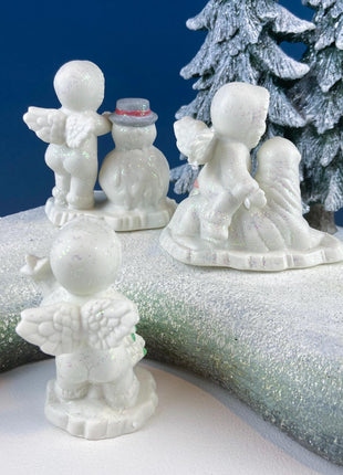 Polar Pals Playing in Snow Under Lit Christmas Tree. 3 White Porcelain Cupid Figurines Celebrating Friendship. Kids Room. Night Light.