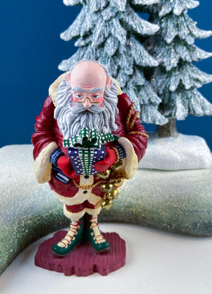 Vintage Porcelain Figurine of Santa Checking His List by Norman Rockwell. Seasonal Display for Home Retail or Office. Collectible Statuette.