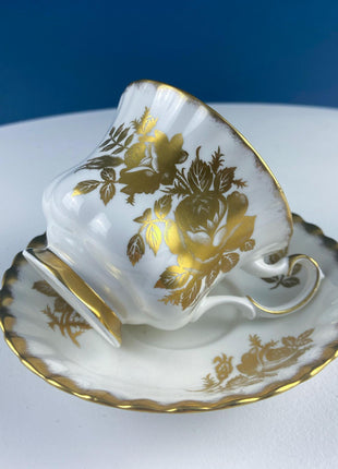 Vintage White and Gold Cup and Saucer. Royal Albert "Golden Rose. " Fine Bone China. Hosting Necessities. Tea Party. Collectibles.