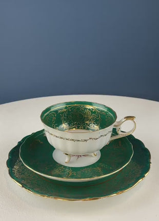 Vintage Tea Cup and Saucer,marking on bottom,green/gold,excellent