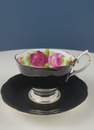 Black Cup and Saucer with Roses on White Background Inside the Cup. Royal Albert Old Country Rose Tea Set. Hand Painted Pink & Red Roses.