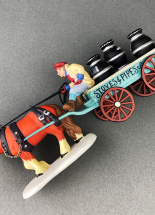 Village Accessories by Department 56. Stoves and Pipes. A New Potbellied Stove For Christmas. Set of Two Handpainted Porcelain Figurines.