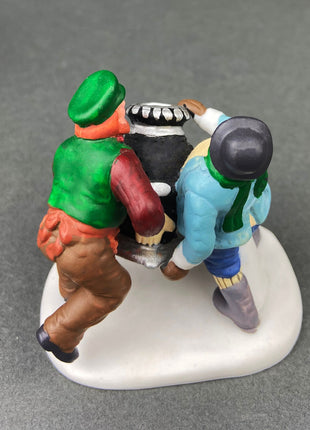 Village Accessories by Department 56. Stoves and Pipes. A New Potbellied Stove For Christmas. Set of Two Handpainted Porcelain Figurines.