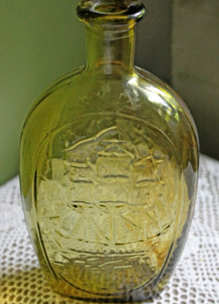 Vintage Decorative Bottle in Amber Color with Embossed Ship, Eagle, Initial TWD, and Franklin.