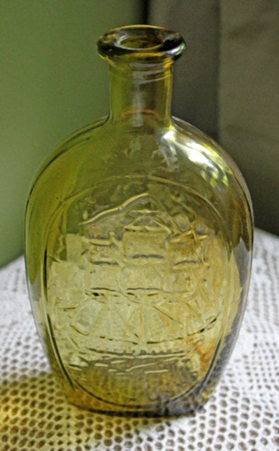 Vintage Decorative Bottle in Amber Color with Embossed Ship, Eagle, Initial TWD, and Franklin.