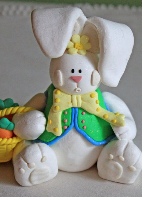 Bunny Figurine with Basket and Carrots.