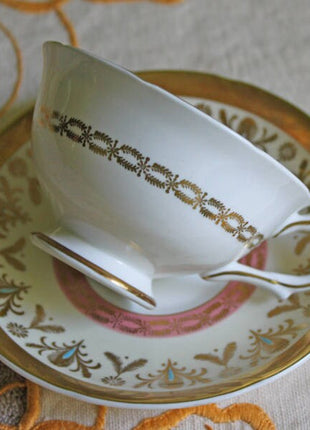 Antique Royal GraftonTeacup and Saucer with Scalloped Gold Rim, Flowers, and Handle.