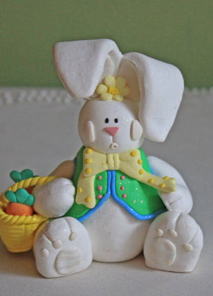 Bunny Figurine with Basket and Carrots.