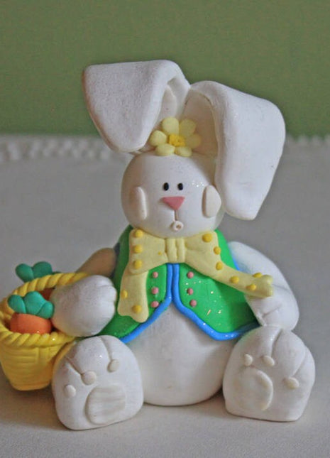 Bunny Figurine with Basket and Carrots.