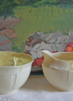 Belleek Porcelain Creamer and Sugar Bowl. Belleek Bow Pattern Sugar Bowl and Creamer Made of Thin Porcelain in Ireland. Reg 0857.