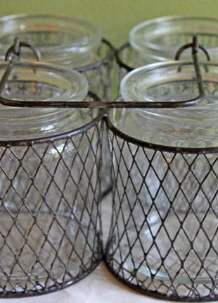 Clear Glass Containers in Metal Joined Basket with Handle in Center.  Four Jars in Metal Basket for Serving Odds and Ends.