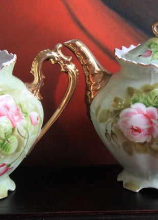Lefton Coffee Pot with Lid. Porcelain Heritage Green Pot with Hand Painted Pink Roses, Crimped Rim, Scalloped Foot, Ornate Handle.