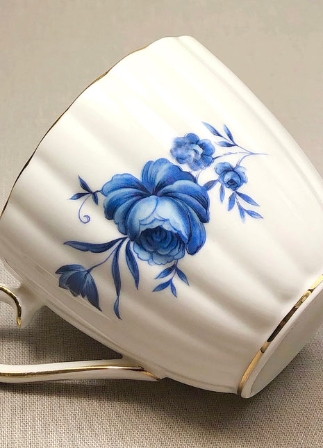 Vintage Tea Cup with Saucer by Royal Tuscan. Blue White Floral Pattern. Made in England.