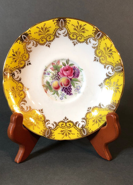 Antique Cup and Saucer by Paragon. White, Yellow, Gold, Pink. Made in England.