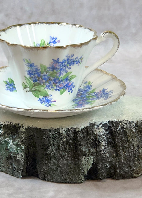 Tea Cup and Saucer by Gladstone ,  England.  Marked # 8982 in Gold.