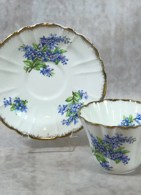Tea Cup and Saucer by Gladstone ,  England.  Marked # 8982 in Gold.