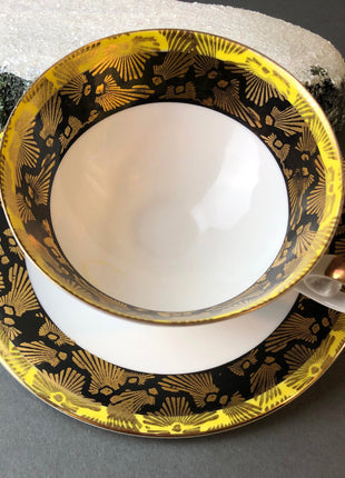Antique Bavarian Porcelain Tea Cup and Saucer by Eberthal. White Black Gold and Yellow Colors.