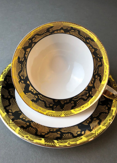 Antique Bavarian Porcelain Tea Cup and Saucer by Eberthal. White Black Gold and Yellow Colors.