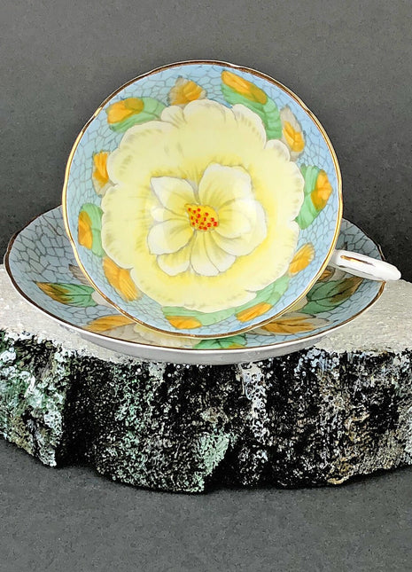 Vintage Teacup with Saucer by Tuscan. Blue Background and Yellow White Floral Pattern. Unique Cup Made in England.