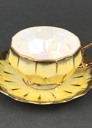 Antique Cup and Saucer Set by Royal Sealy China, Japan.  Three Footed Yellow Tea Set  with Iridescent Background.