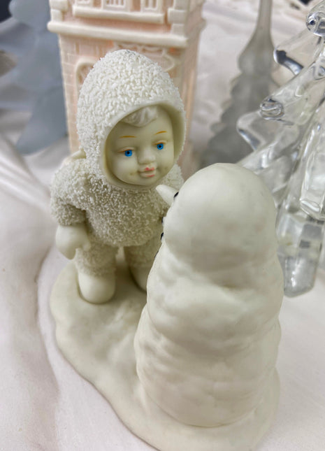 Village Accessories by Department 56. Snow Babies. Snow Baby Playing with Snowman.