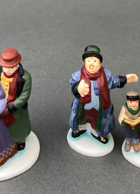 Village Accessories by Department 56.  Town Square Carolers.  Handpainted Set of Three Porcelain Figurines.  Heritage Village Collection.