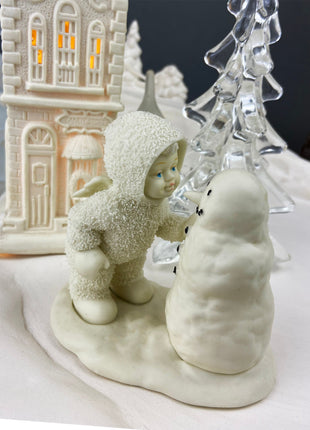 Village Accessories by Department 56. Snow Babies. Snow Baby Playing with Snowman.