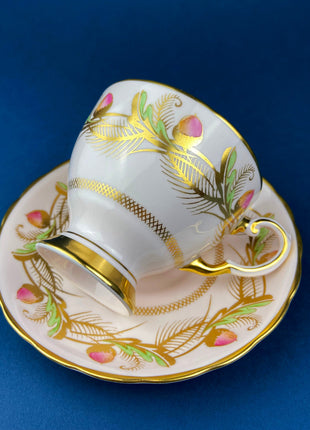 Vintage Tea Cup and Saucer.  Tuscan. Beautiful Pink Coloring with Warm Gold and Acorn Motif.  Fine Bone China. Made in England.