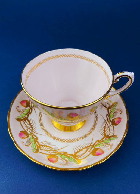 Vintage Tea Cup and Saucer.  Tuscan. Beautiful Pink Coloring with Warm Gold and Acorn Motif.  Fine Bone China. Made in England.