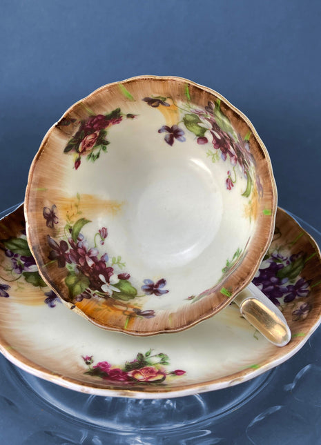 Vintage Cup and Saucer Set. Violets and Roses Motif.  Not Marked by the Manufacturer.