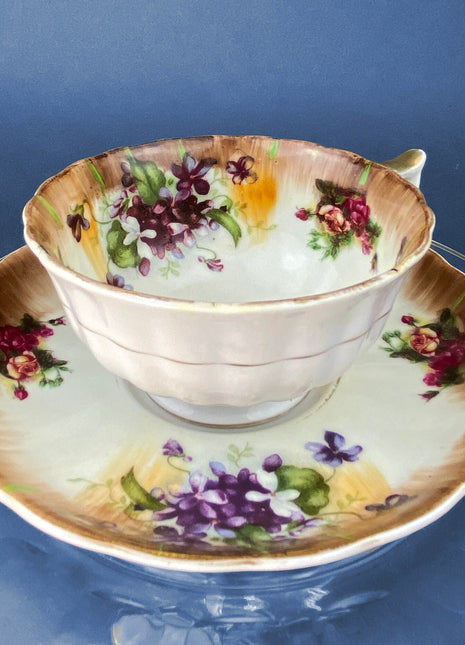 Vintage Cup and Saucer Set. Violets and Roses Motif.  Not Marked by the Manufacturer.