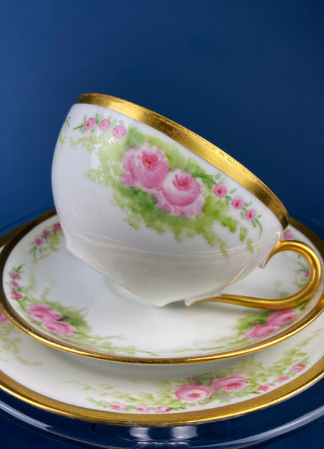 Antique Bavarian Porcelain Teacup, Saucer, and Small Dessert Plate. Hand-Painted Trio. Garlands of Roses. J & C Ovid. Made in Germany.