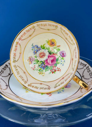 Regency Tea Cup and Saucer. Antique Hand-Painted Porcelain Cup and Saucer. Peach with Wild Flower Bouquet Motif. Made in England.