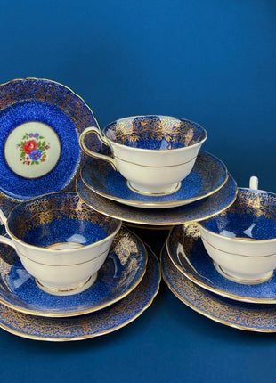 Vintage Aynsley Tea Cup Trio. Cup, Saucer, and Small 6" Dessert Plate. Blue and Gold, with Hand Painted Bouquet of Flowers. Fine Bone China.
