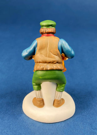 Christmas Village Accessories by Dept. 56. Porcelain, hand Painted Fruit Vendor. Chelsea Market Fruit Monger and Cart. Holiday Celebration.