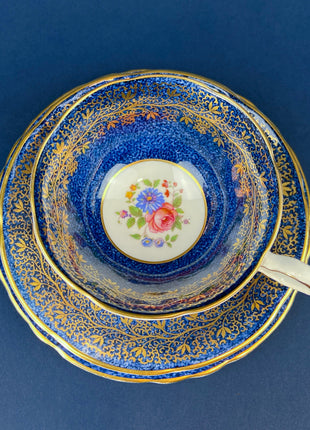 Vintage Aynsley Tea Cup Trio. Cup, Saucer, and Small 6" Dessert Plate. Blue and Gold, with Hand Painted Bouquet of Flowers. Fine Bone China.