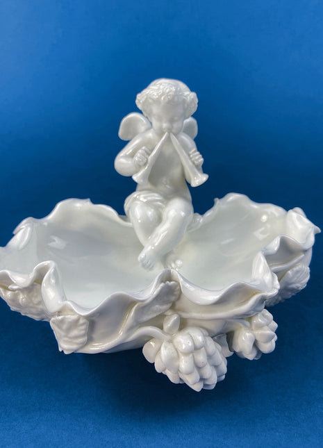 White Porcelain Cupid Soap Dish. Cupid Playing Flutes. Beautifully Detailed Flora & Fauna. Gilman Coll. "Amore", NY. Original Gift of Love.