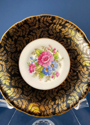 Royal Staford Cup and Saucer. Black with Gold Leaves. Hand Painted Flower Bouquet Inside of Cup and on the Plate.